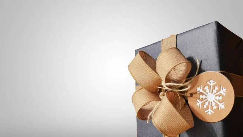 A wrapped gift box with a bow