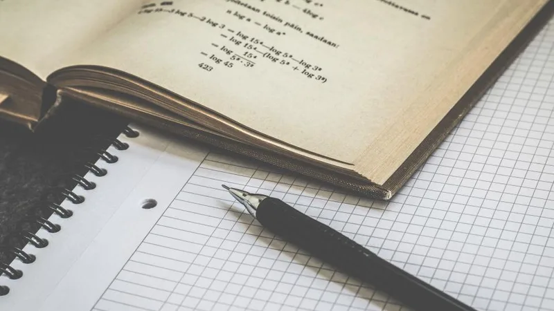 A notebook with handwritten equations