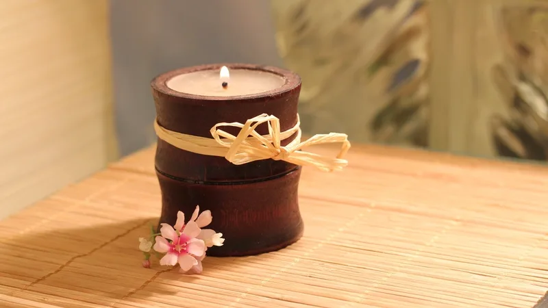 A candle on a wooden table