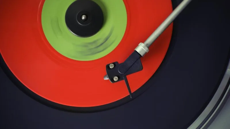 A vinyl record spinning on a turntable