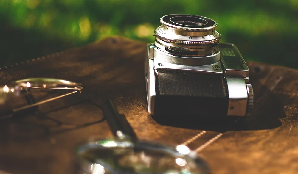 Camera on a wooden table