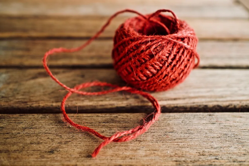 Ball of red yarn